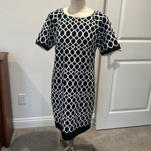 Taylor , black and white shirt sleeved dress. Size 6